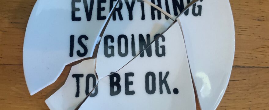 Broken plate with the words "Everything is going to be OK."